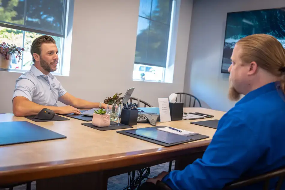waterford employee meeting with a client